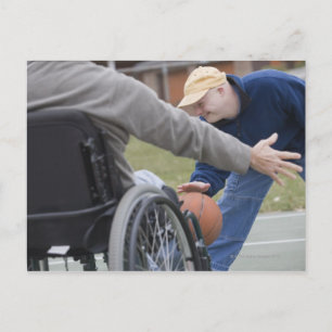 Disabled man playing basketball with his son postcard
