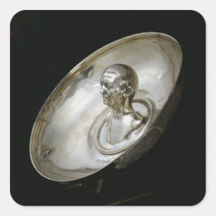 Dish with the bust of a man inside square sticker