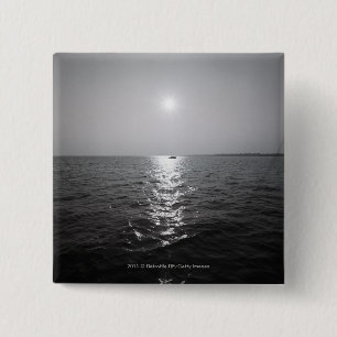 Distant boat on ocean 15 cm square badge