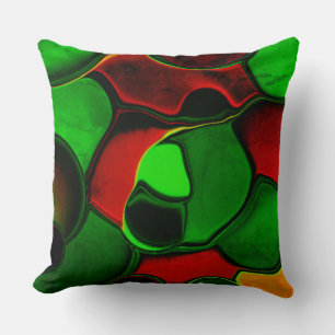 Distorted and strange shapes, red and green colour cushion