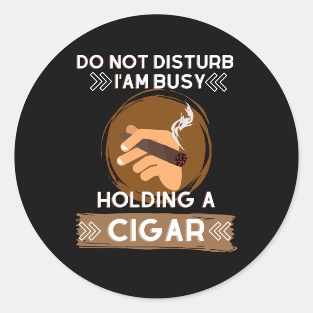Do not Disturb I am busy holding a Cigar Classic Round Sticker (Front)