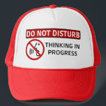 DO NOT DISTURB: Thinking in Progress (Red Hat) Trucker Hat<br><div class="desc">DO NOT DISTURB: Thinking in Progress (designed by Ruji Chapnik).</div>