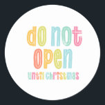 Do Not Open Until Christmas Holiday Classic Round Sticker<br><div class="desc">This fun round holiday sticker will bring a smile to your face. It has the words "do not open until Christmas" written in colourful letters. Use it as a finishing touch for your gift wrapping.</div>
