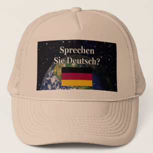 Do you speak German? in German. Flag & Earth Trucker Hat