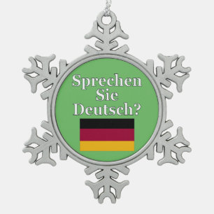Do you speak German? in German. Flag Snowflake Pewter Christmas Ornament