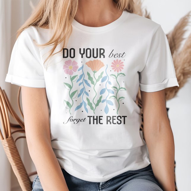 "Do Your Best Forget the Rest" Boho Floral T-Shirt (Young blond woman wearing a "Do Your Best Forget the Rest" Boho Floral T-Shirt.)