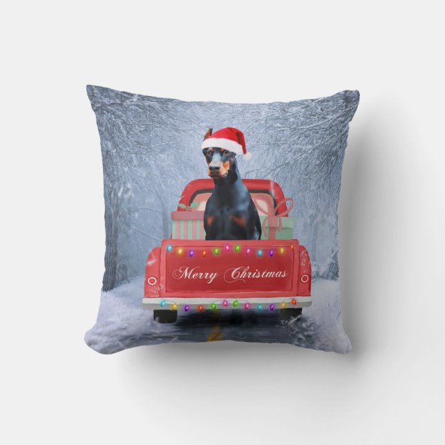 Doberman Dog in Snow sitting in Christmas Truck Cushion (Front)