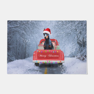 Doberman Dog in Snow sitting in Christmas Truck Doormat