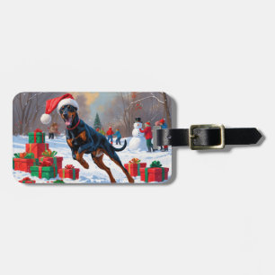 Doberman Running in Snow with Christmas Hat Luggage Tag