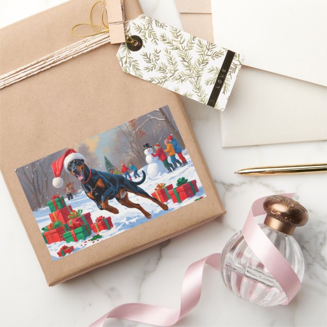 Doberman Running in Snow with Christmas Hat Rectangular Sticker (Gifting)