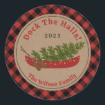 Dock The Halls Canoe Christmas Tree Plaid Classic Round Sticker<br><div class="desc">Illustration of a red canoe decorated with Christmas lights with Christmas tree inside.  Background is brown cardstock with red and black buffalo plaid border.  Personalise the text.</div>