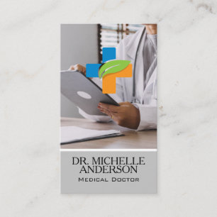 Doctor Looking Over Patients Charts Business Card