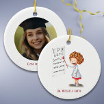 Doctor Optometrist Girl Christmas Photo Ceramic Ornament<br><div class="desc">Cute Christmas photo ornament with a girl working on an eye exam on one side and a photo on the other. Perfect for medical doctors and nurse graduates. Personalise the text with your own message. Illustrated and designed by Patricia Alvarez.</div>