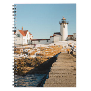 Dog Bar Lighthouse along the ocean coastline of th Notebook