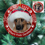 Dog First Christmas Snowflakes 2 Photo Red Ceramic Ornament<br><div class="desc">Create a personalised photo keepsake ornament for a puppy or dog with this festive red and white round ceramic ornament featuring 2 pictures (one on each side), dog pawprints and snowflakes with your custom text (the sample shows Name's First Christmas). The design is duplicated on both sides with the same...</div>