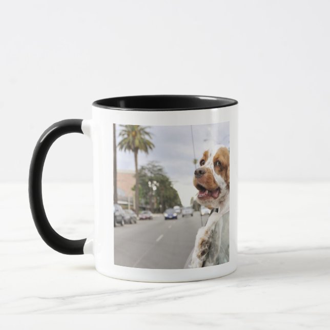 Dog hanging head out of car window mug (Left)