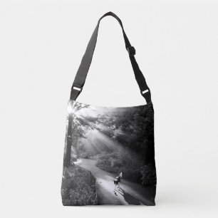 Dog in morning sunlight crossbody bag