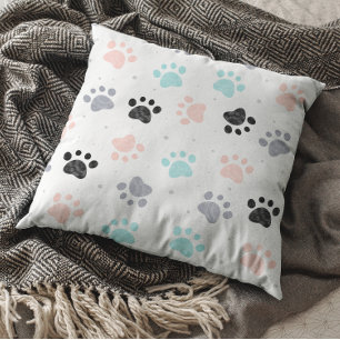 Dog paw prints pattern cushion