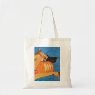 Dog paws and pumpkin bag