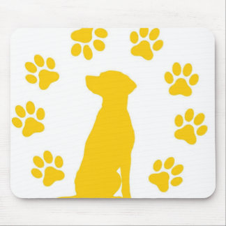 Dog seeting on mouse pad