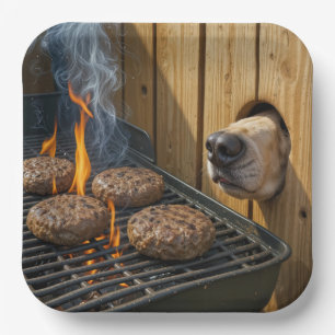 Dog Sniffing Hamburgers On a Barbecue Grill Paper Plate