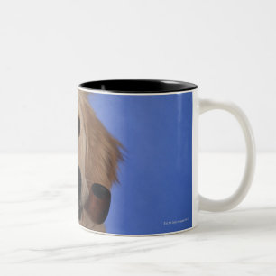 Dog wearing cap, holding smoke pipe Two-Tone coffee mug