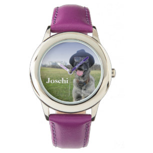 Dog with sunglasses and hat watch