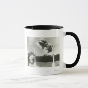 Dogs jumping over miniature high jump bar mug