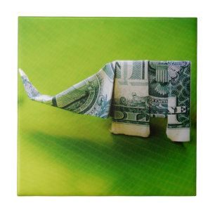 Dollar bill origami Elephant on Green background Ceramic Tile