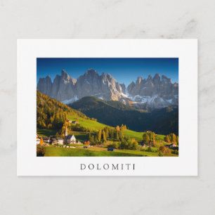 Dolomites village in fall white text postcard