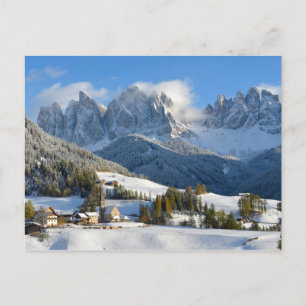 Dolomites village in winter postcard
