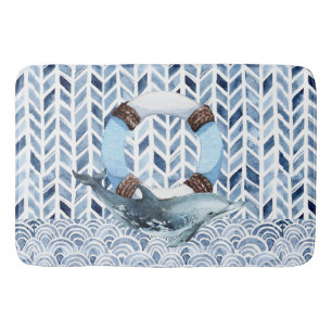 Dolphin and lifebuoy on maritime pattern bath mat