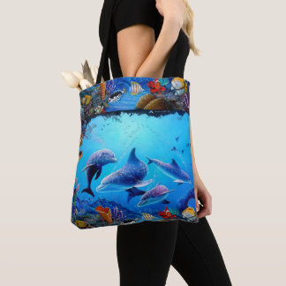 Dolphins blue sea tote bag