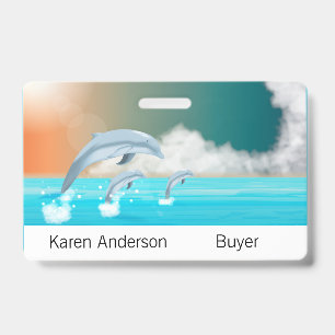 dolphins breaching in the ocean ID badge