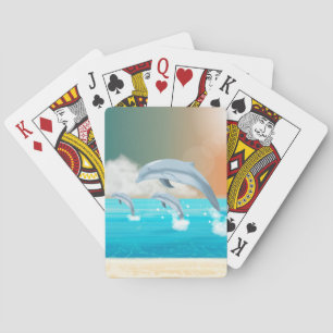 dolphins breaching in the ocean      playing cards