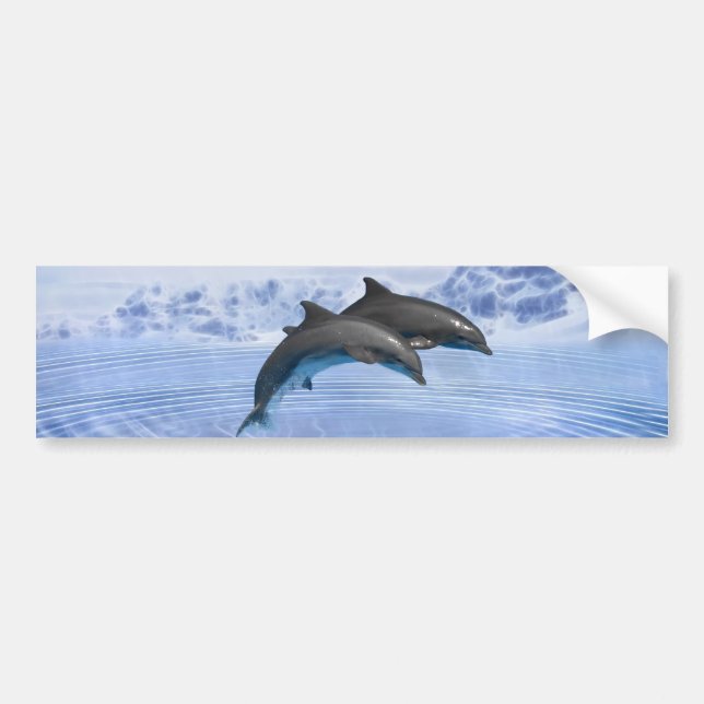 Dolphins in the clear blue sea bumper sticker (Front)