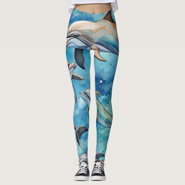 Dolphins swimming in the sea  leggings (Front)