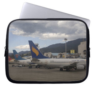 Domestic Chinese jet airliners lined up at Laptop Sleeve