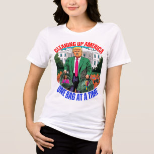 DONALD TRUMP-CLEANING UP AMERICA ONE BAG AT A TIME Tri-Blend SHIRT