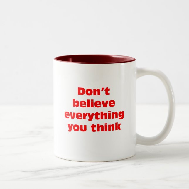 Don't believe everything you think. Two-Tone coffee mug (Right)