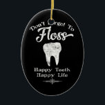 Don't Forget To Floss Chalkboard Ceramic Ornament<br><div class="desc">A fun chalkboard dental themed image with a big white tooth and the message "Don't forget to floss,  happy teeth,  happy life" in black and white.</div>