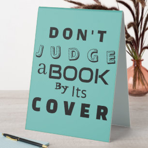 "Don't Judge a Book by Its Cover" Blue Pink Quote