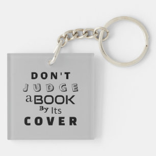 "Don't Judge a Book by Its Cover" Light Grey Key Ring