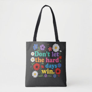 Don't let the hard days win tote bag
