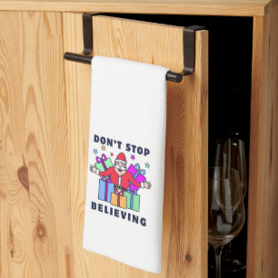 Don't Stop Believing Santa with Gifts Tea Towel
