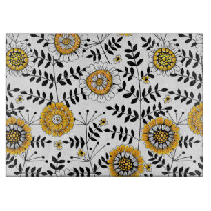 Doodle flowers and leaves in yellow and black cutting board