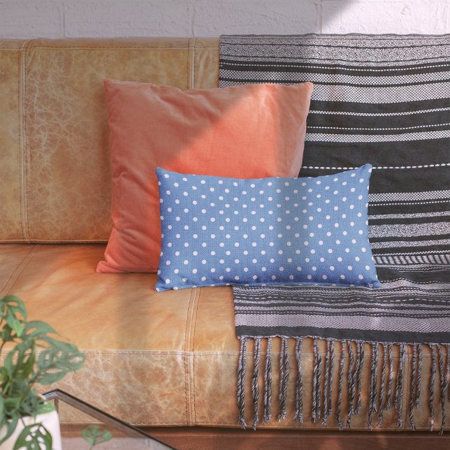 Dotty Delight Blue Decorative Cushion (A Dotty Delight blue accent pillow sits in the centre of the sofa. )