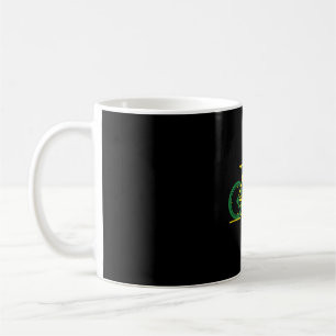 Downhill mountain bike in bright green and yellow coffee mug