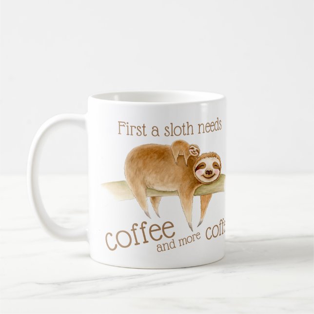 Dozing sloth and cute baby needs coffee slogan mug (Left)