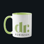 dr. [Custom Name] Mug<br><div class="desc">Celebrate professional achievements in style with this sleek and modern "dr." mug, featuring bold typography and a customisable name beneath. The sophisticated light green and white design, accented with a contrasting green interior and handle, makes it a perfect gift for doctors, PhDs, or anyone with a well-deserved title. Whether for...</div>